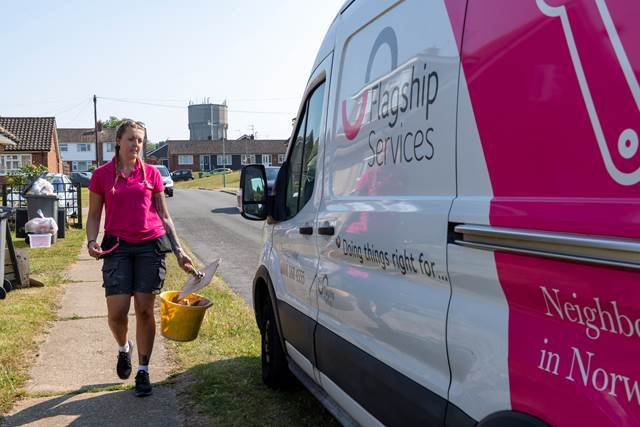 Person walking next to van