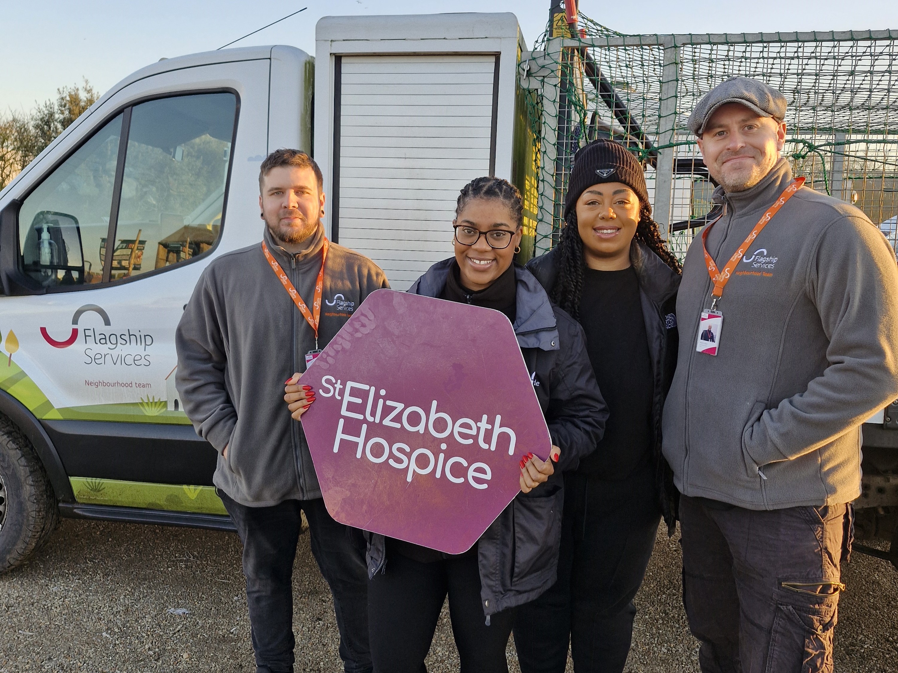 1. L-R Flagship’s Jamie Davies, Natacha Cravid, Tanaya Burnett and Martin Allen pose in front of a Flagship Neighbourhood Services truck during the Christmas tree collection for St Elizabeth Hospice