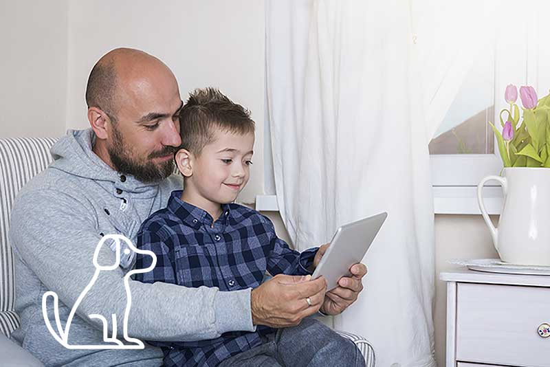 Parent and child looking at tablet
