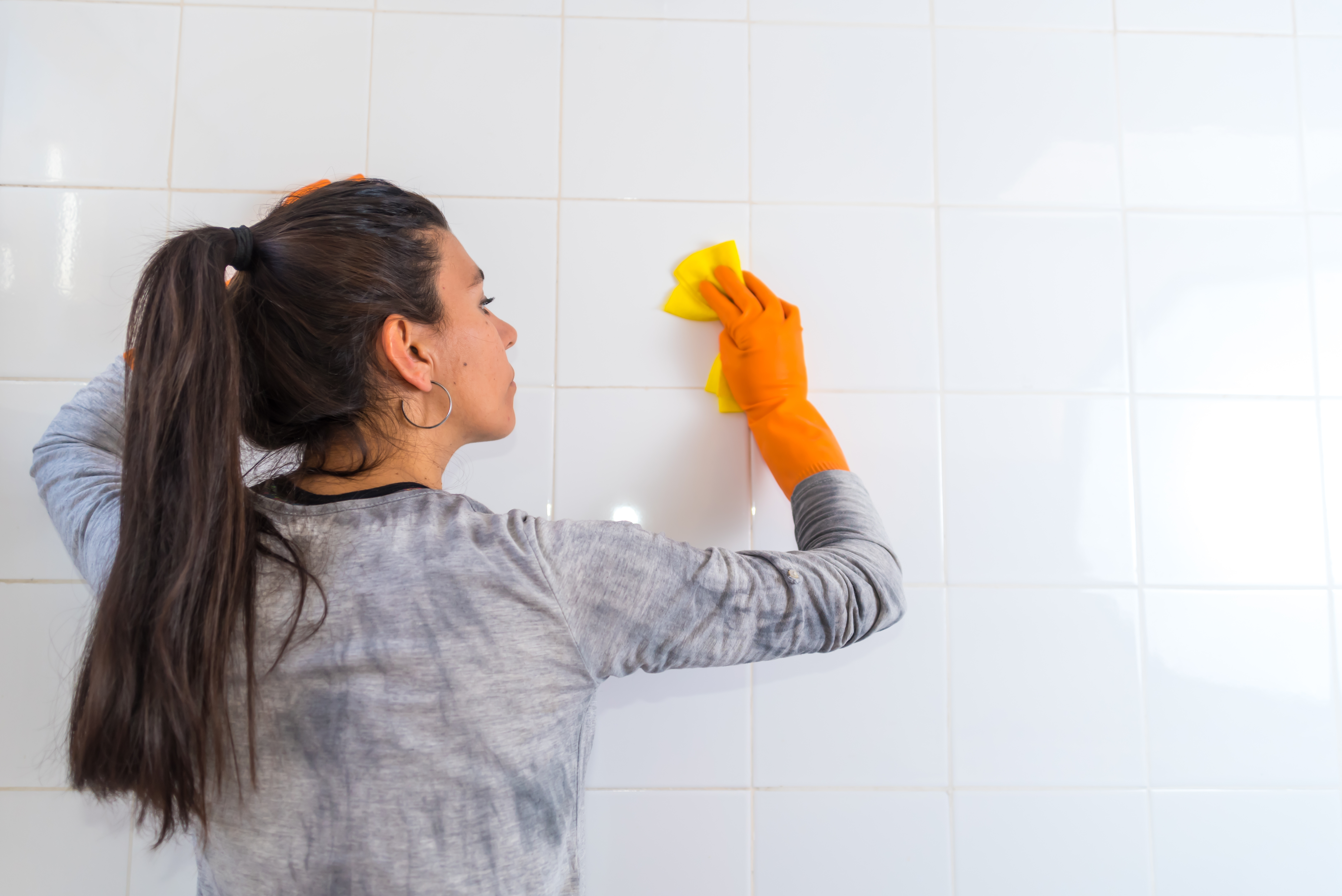 Wiping bathroom tiles