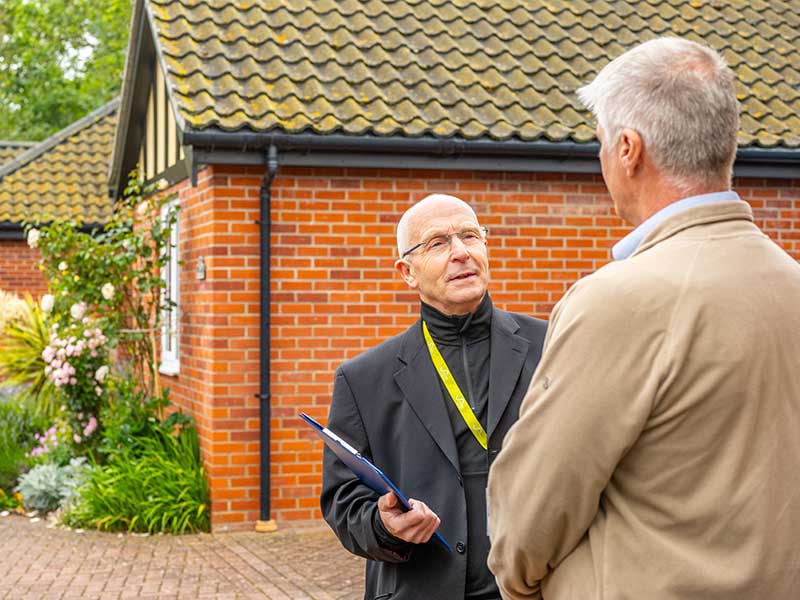 Men talking outside